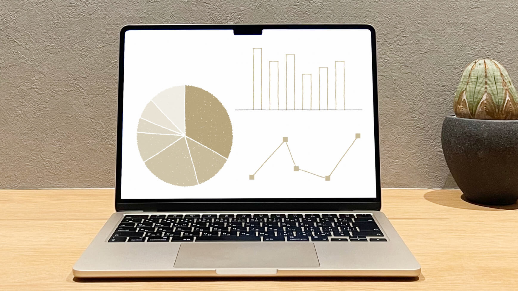 Laptop on a wooden desk showing three data visuals: a beige pie chart on the left, a bar chart top right, and a line graph bottom right on a white screen.