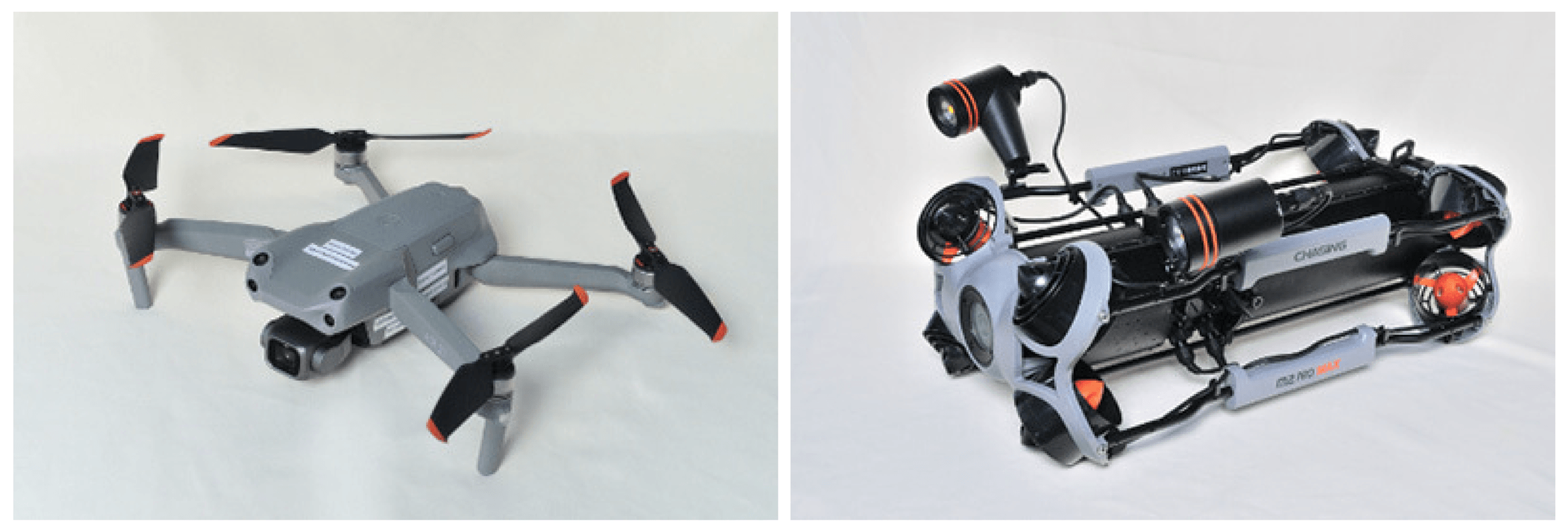 UAVとROV - 株式会社SeaChallenge Two grey quadcopter drones shown side by side on a white background, left with arms extended and orange-tipped propellers, right folded for storage with visible camera module